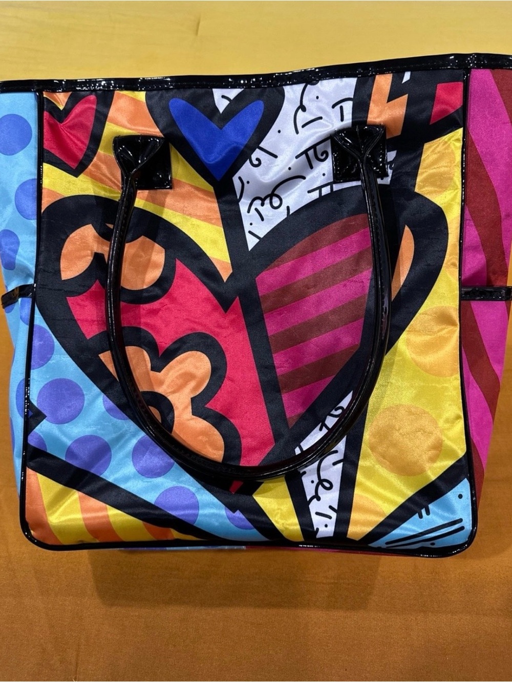 Heys Bold Multicolor Heart-Print Tote Bag with Black Patent Handles